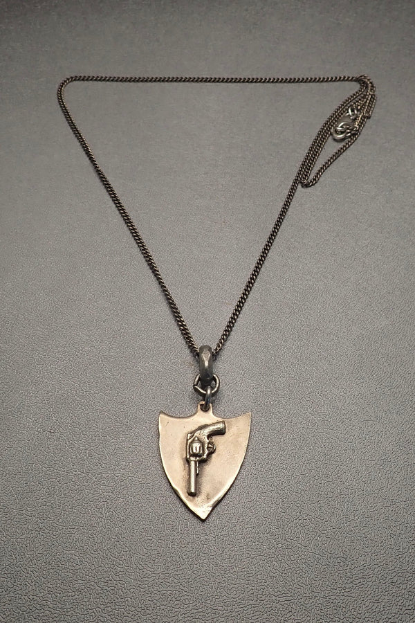 REVOLVER SHIELD PENDANT