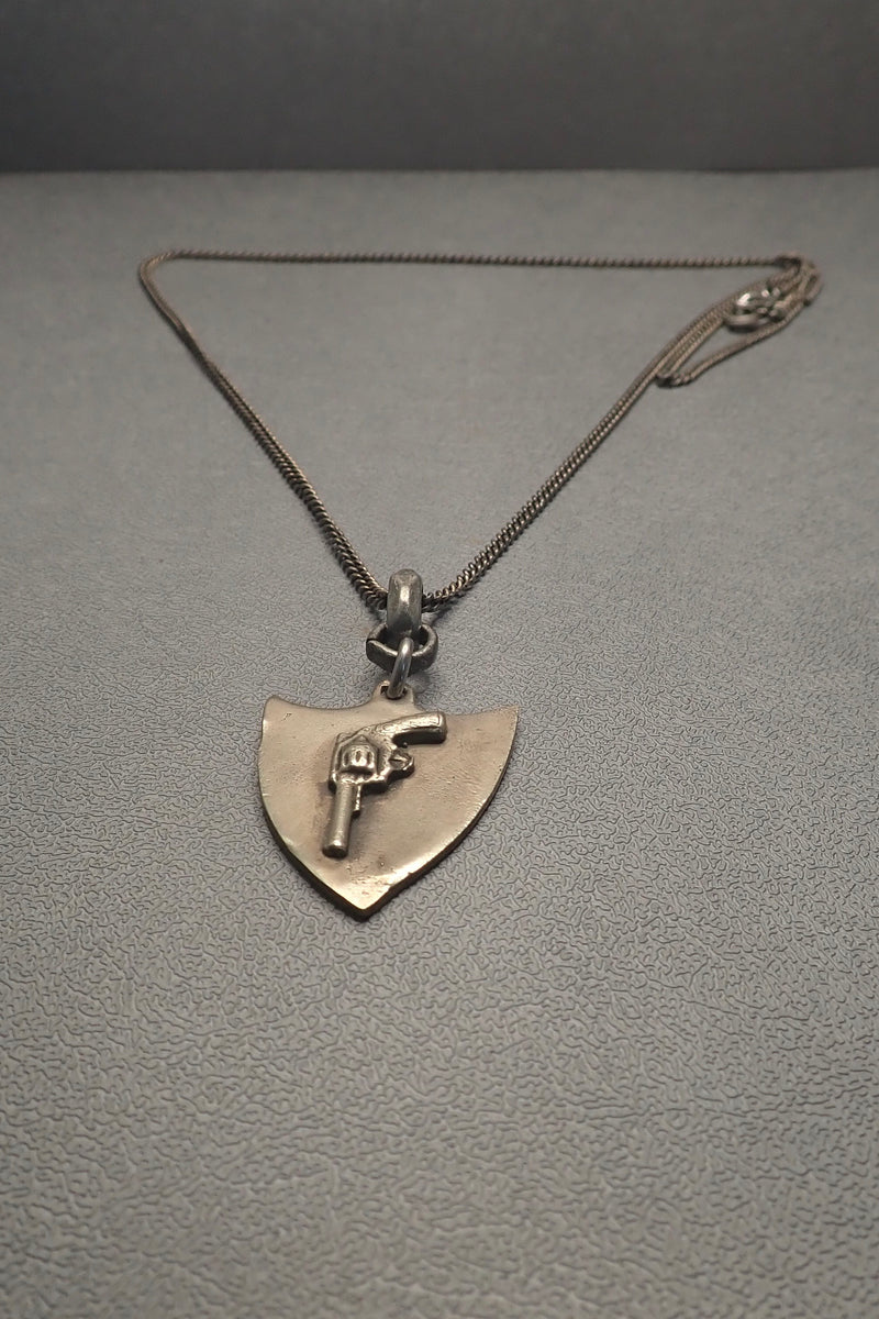REVOLVER SHIELD PENDANT