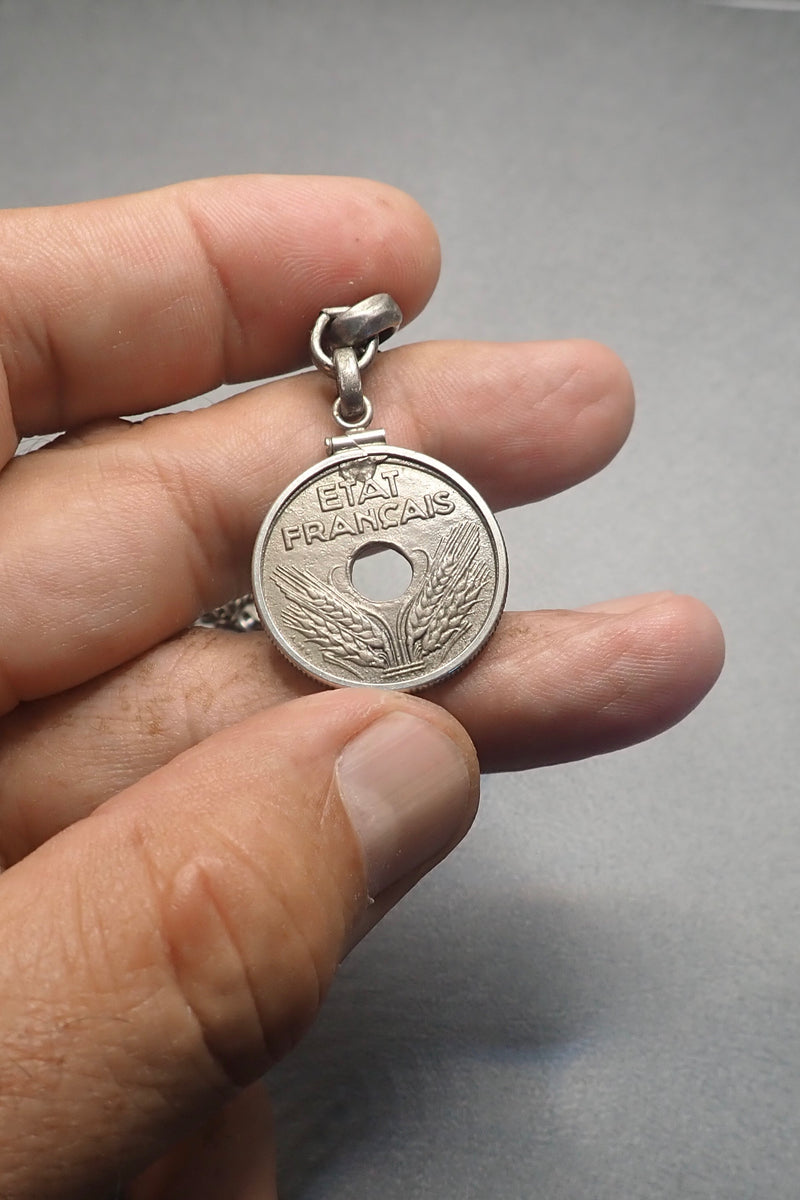 HOLE COIN PENDANT