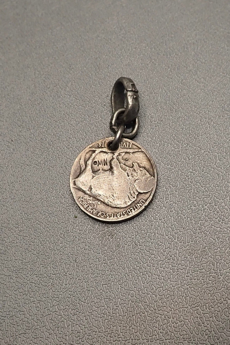 INDIAN SKULL CARVED COIN