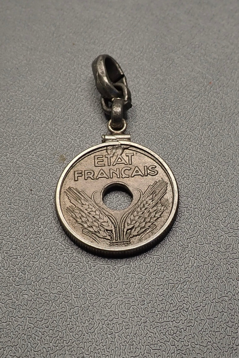 HOLE COIN PENDANT
