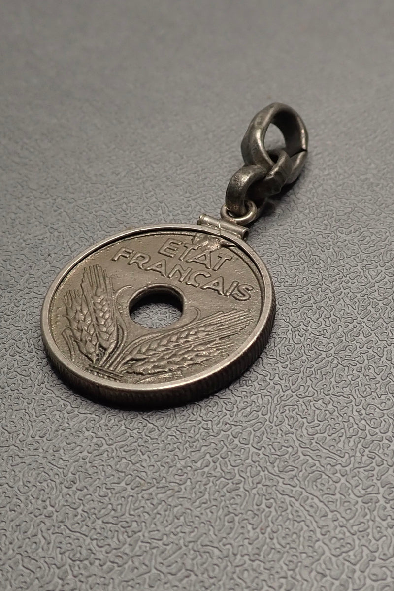 HOLE COIN PENDANT