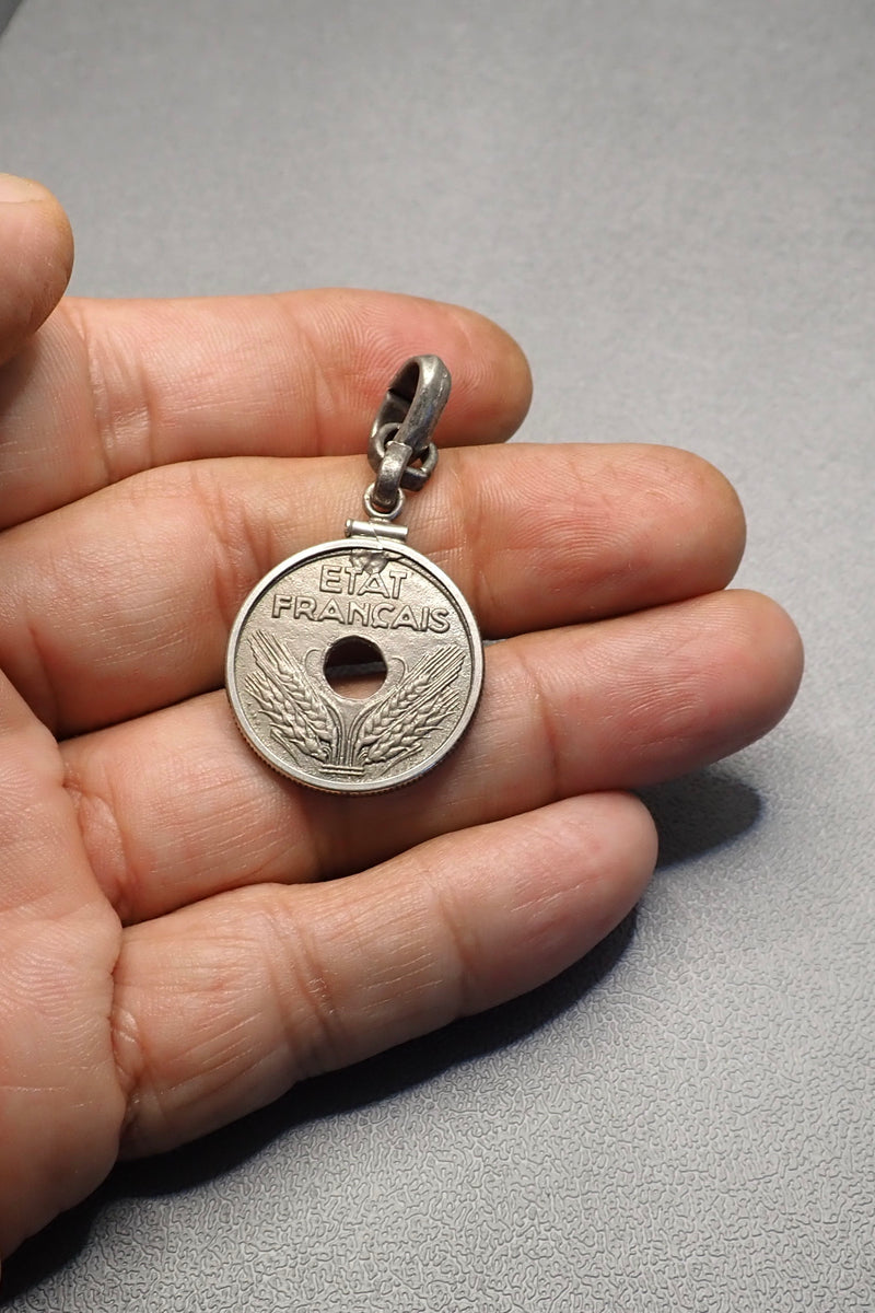 HOLE COIN PENDANT