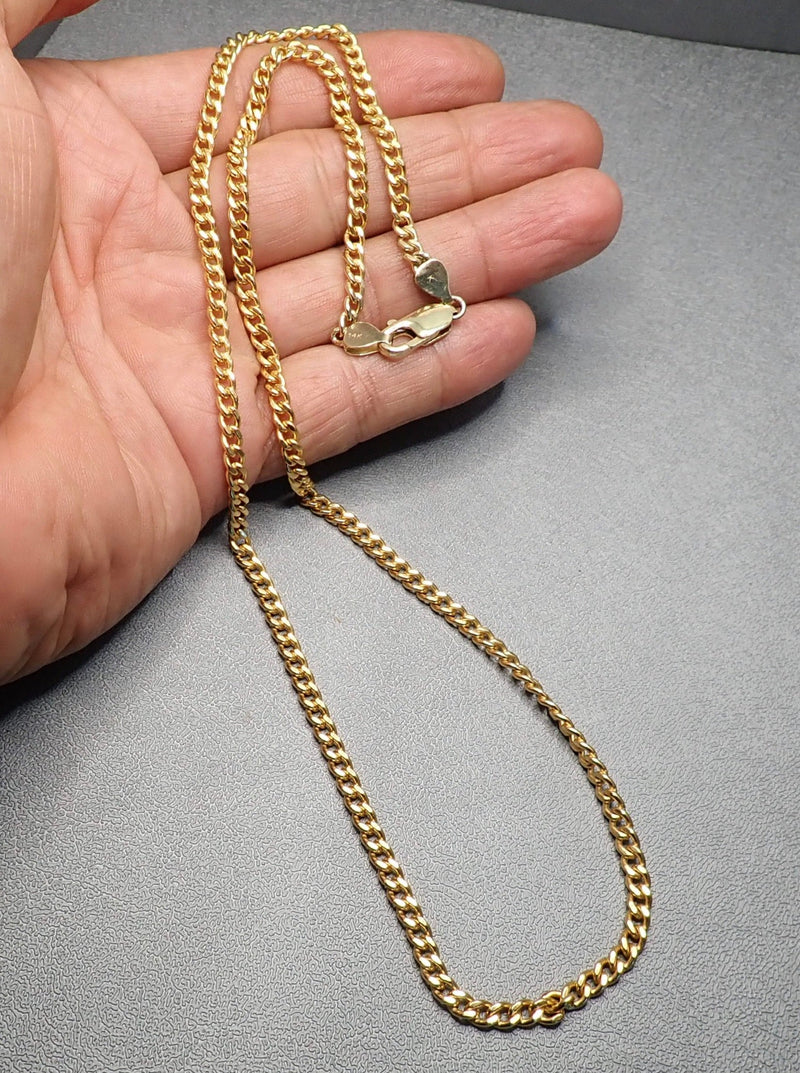 14 K GOLD CUBAN CHAIN - one made in