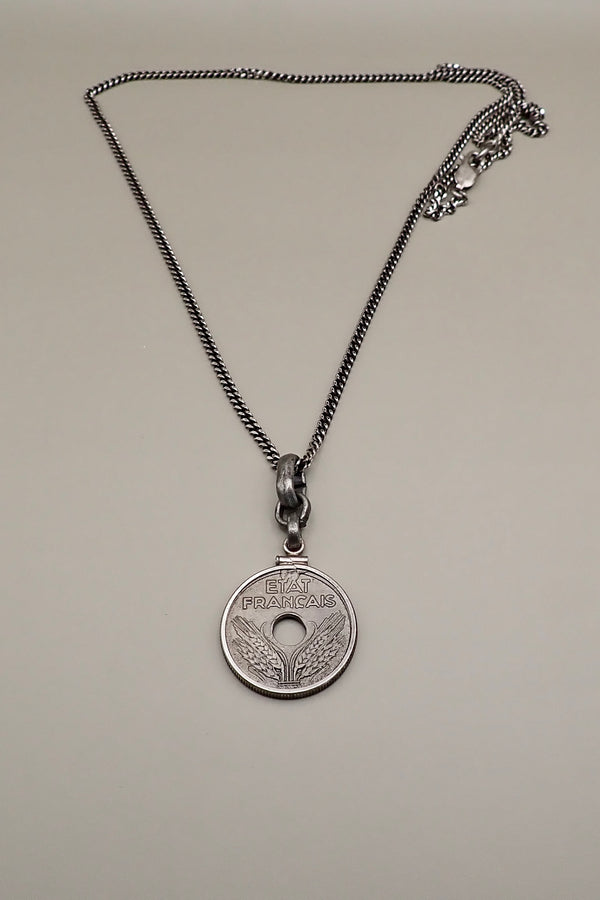 HOLE COIN PENDANT