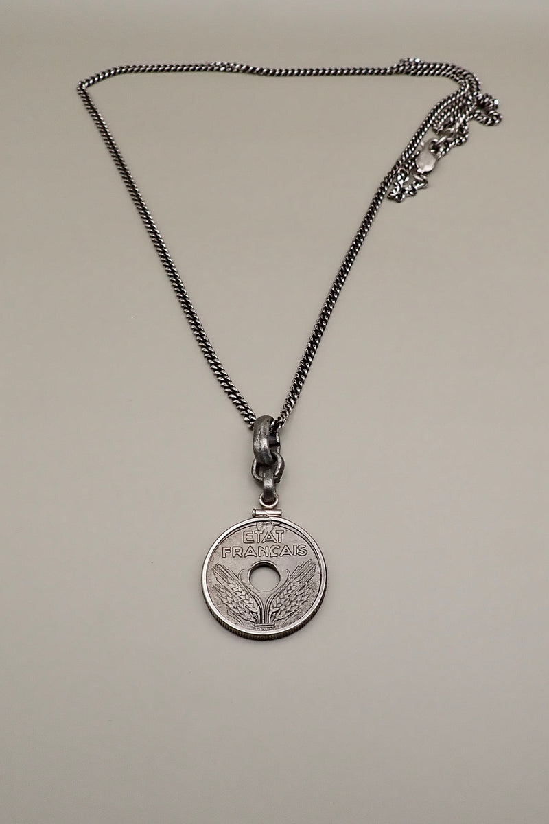 HOLE COIN PENDANT
