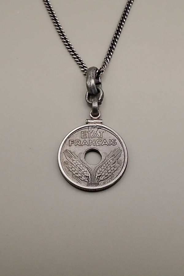 HOLE COIN PENDANT