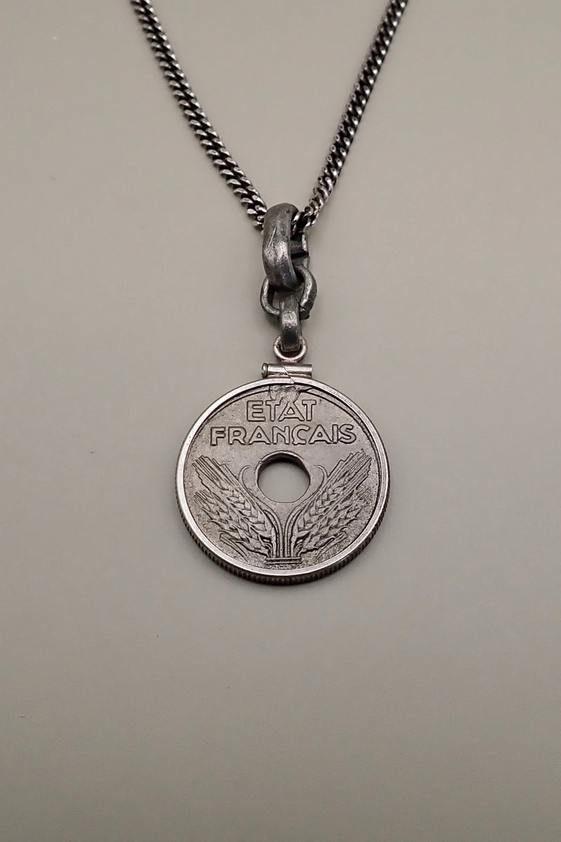 HOLE COIN PENDANT