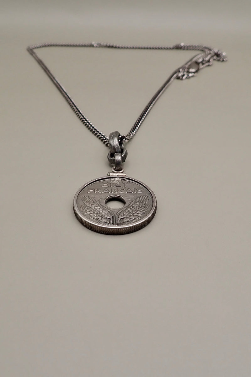HOLE COIN PENDANT