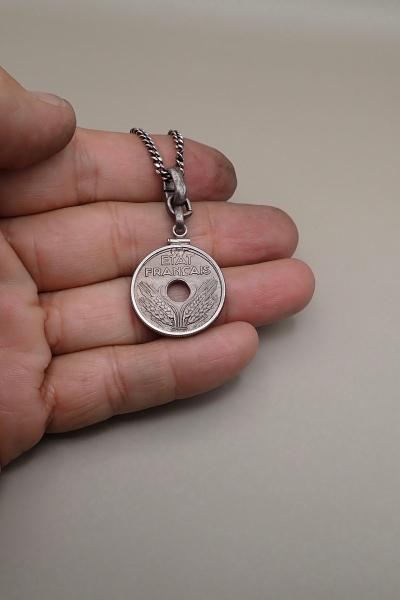 HOLE COIN PENDANT