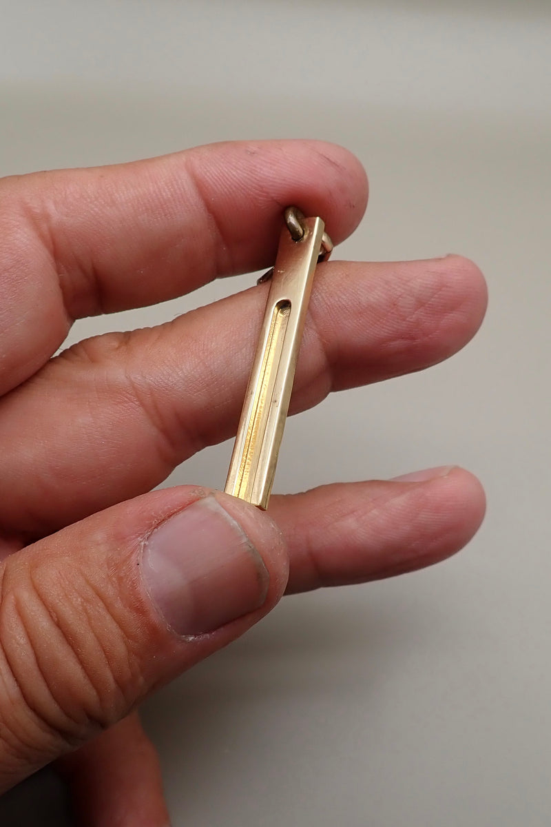 ELONGATED TAG PENDANT