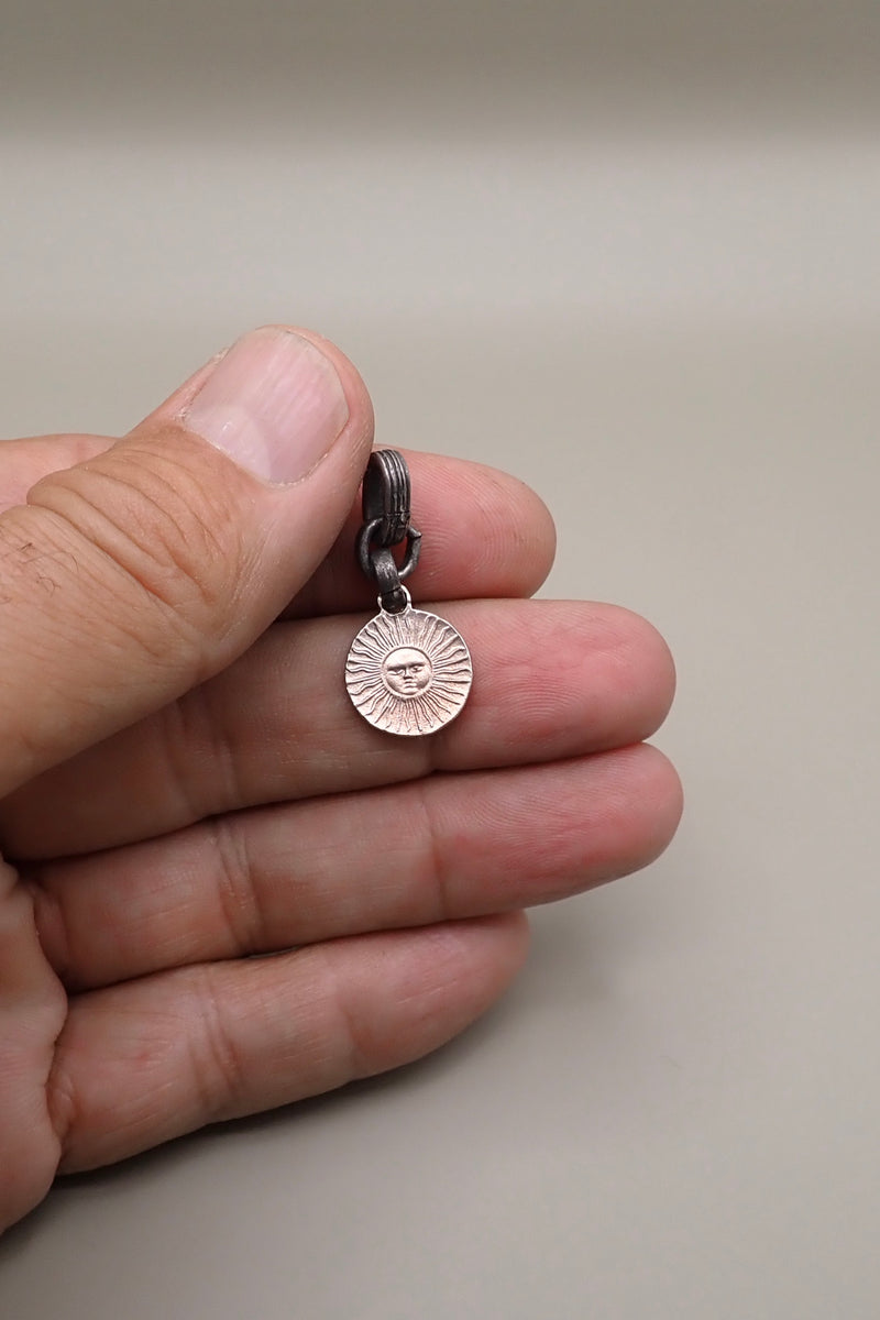 SILVER SUN PENDANT