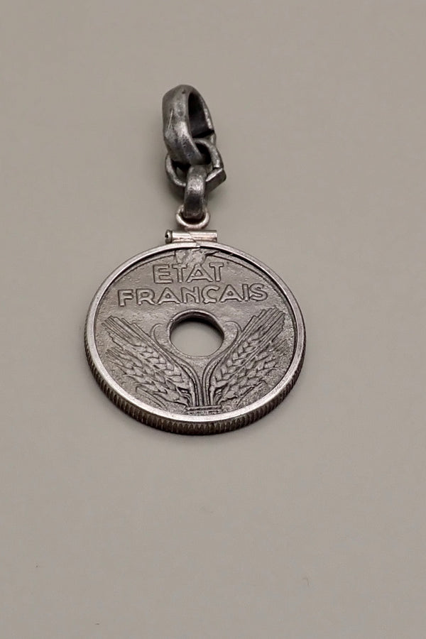 HOLE COIN PENDANT