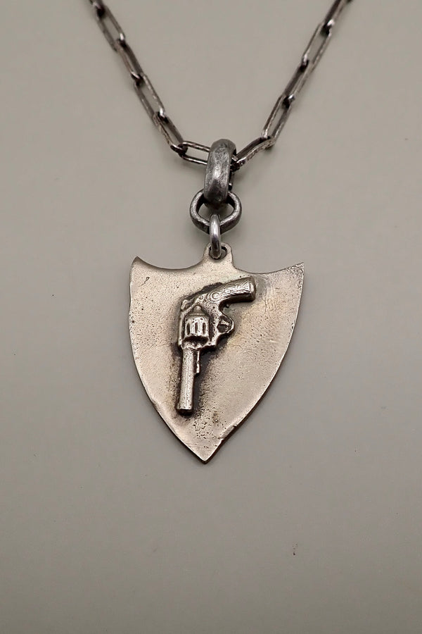 REVOLVER SHIELD PENDANT