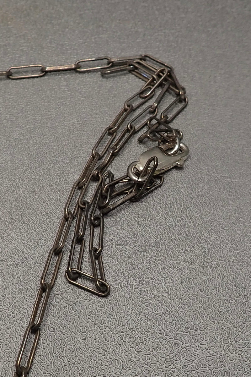 BRONZE CARVED SKULL PENDANT - two made