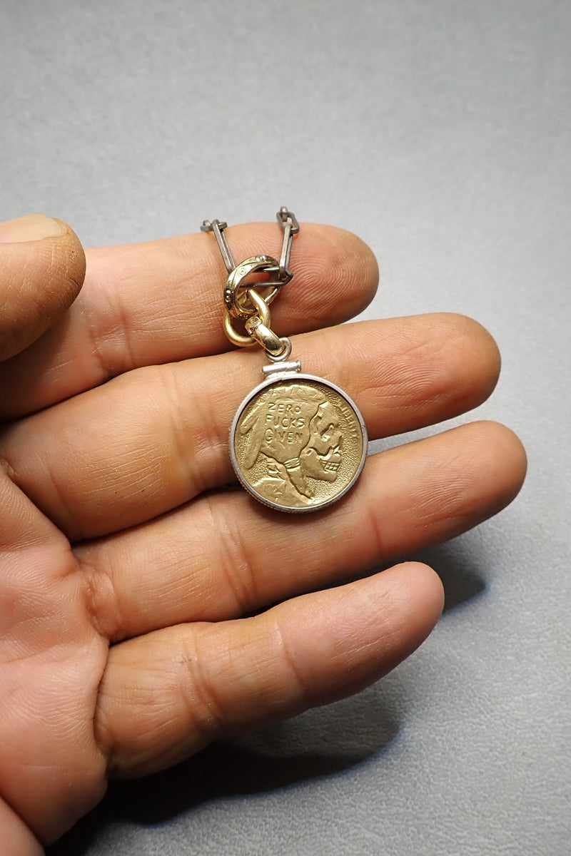 BRONZE CARVED SKULL PENDANT - two made