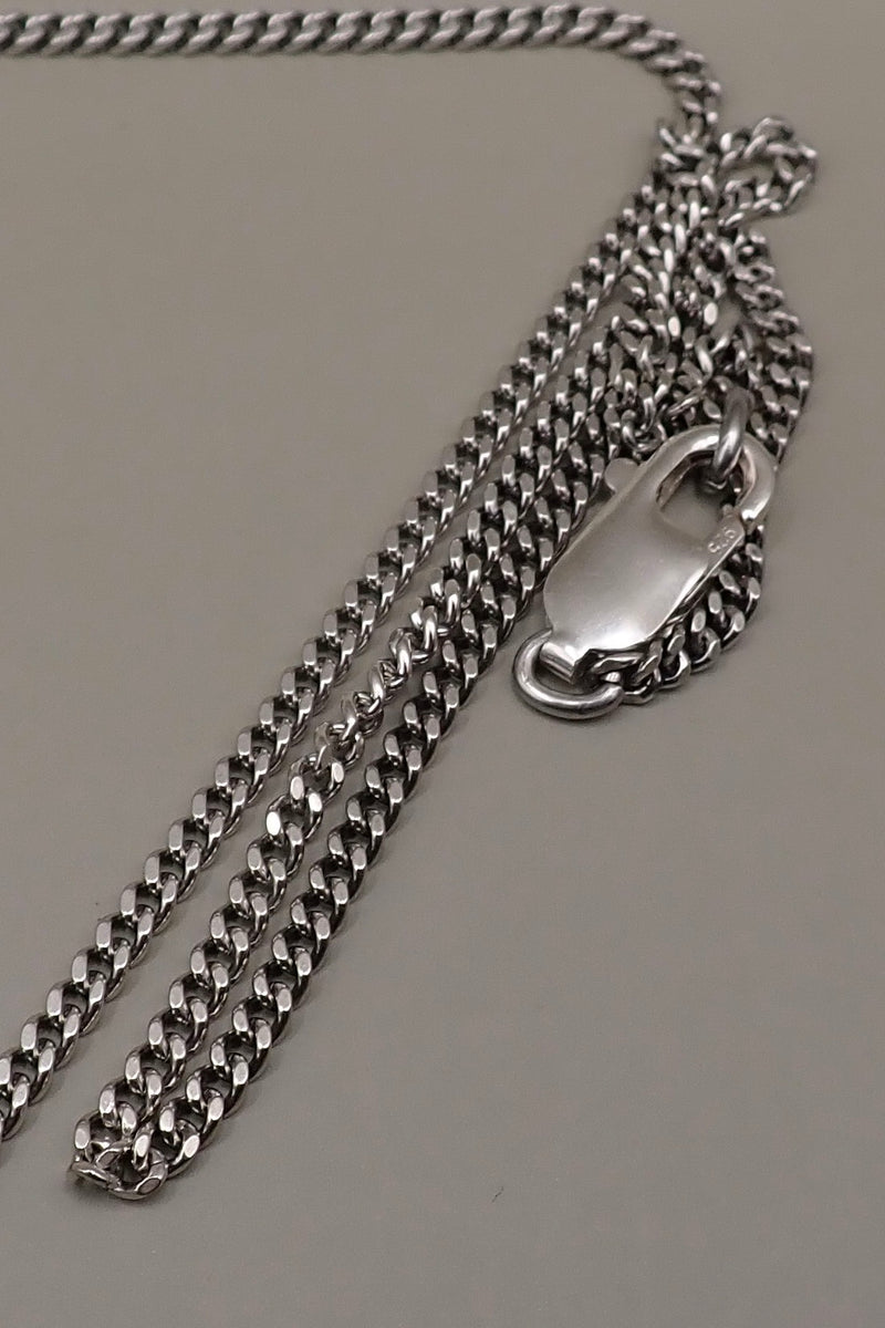 THE FEATHER NECKLACE