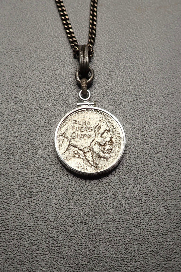 SILVER CARVED SKULL PENDANT