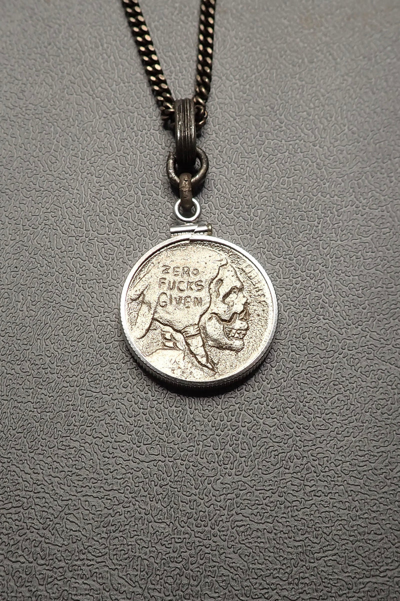 SILVER CARVED SKULL PENDANT