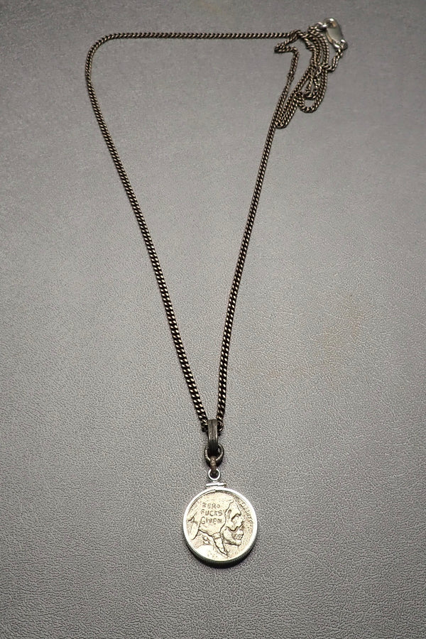 SILVER CARVED SKULL PENDANT