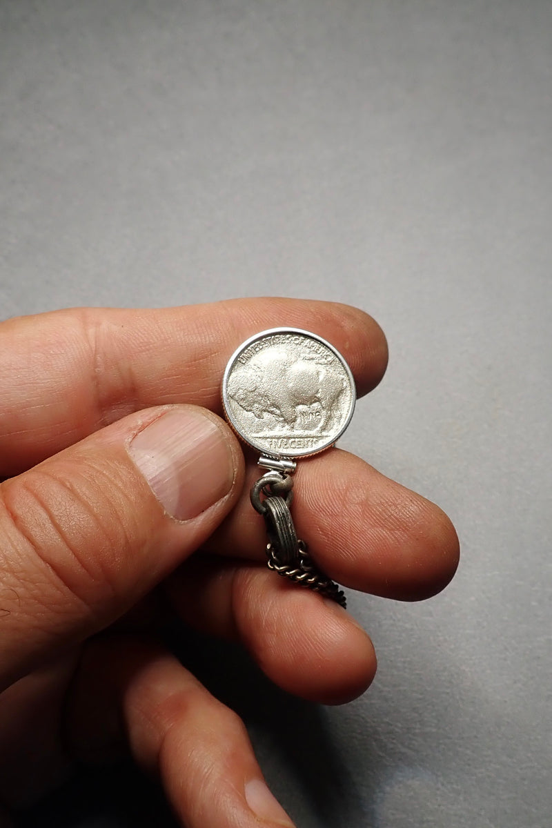 SILVER CARVED SKULL PENDANT