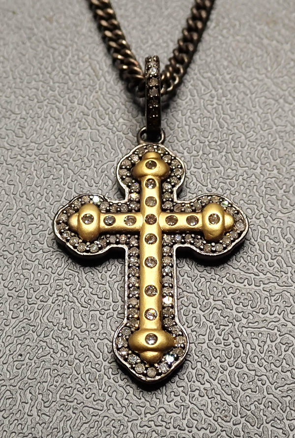 Product named 14 K GOLD/DIAMOND CROSS NECKLACE sold by Dirty Hands Jewelry. The product is a 14 k gold and diamonds cross pendant on an oxidized big silver flat links chain. The product price is $620.00 and the weight is 0.0992 lb.