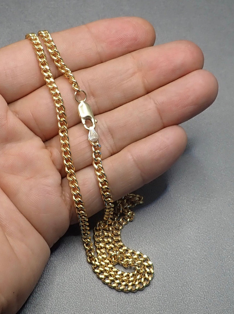 14 K GOLD CUBAN CHAIN - one made in